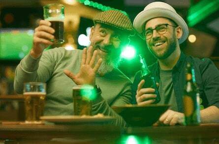 Happy friends drinking beer