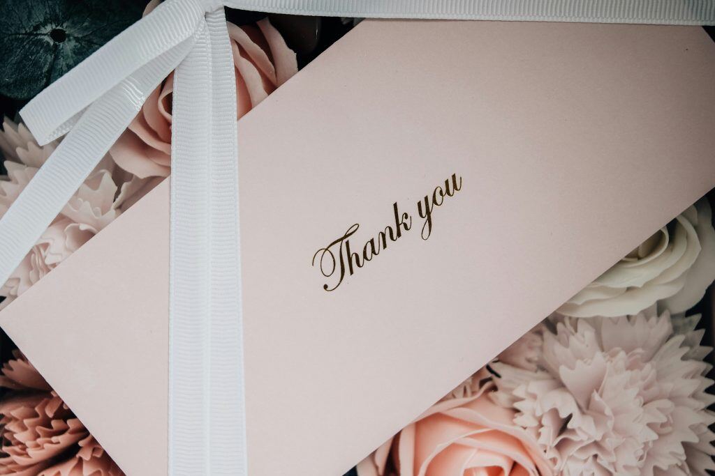 personalized thank you card, an example of a holiday gift for clients.