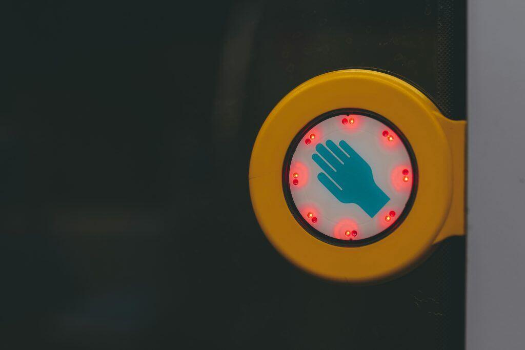 illuminated sign indicating that you need to wait, highlighting the importance of understanding the dos and dont's when it comes to writing an employee reference letter