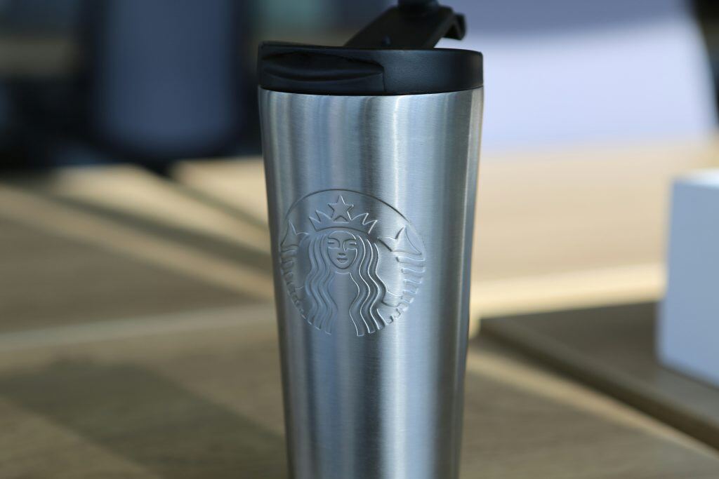 thermal travel mug, an example of a holiday gift for clients.