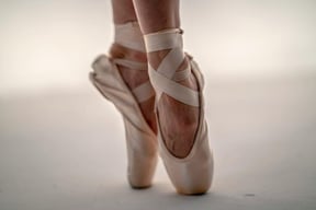 ballerina's feet, depicting the flexibility offered by doordash gift cards