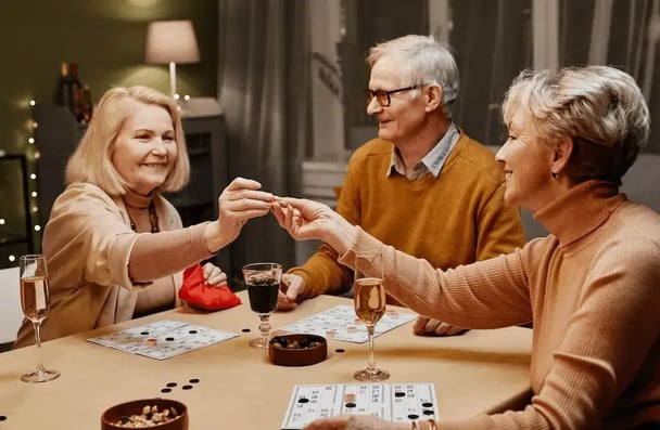 Old people playing board game