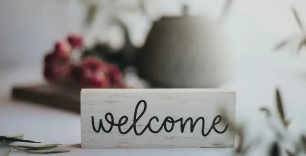 wooden welcome sign