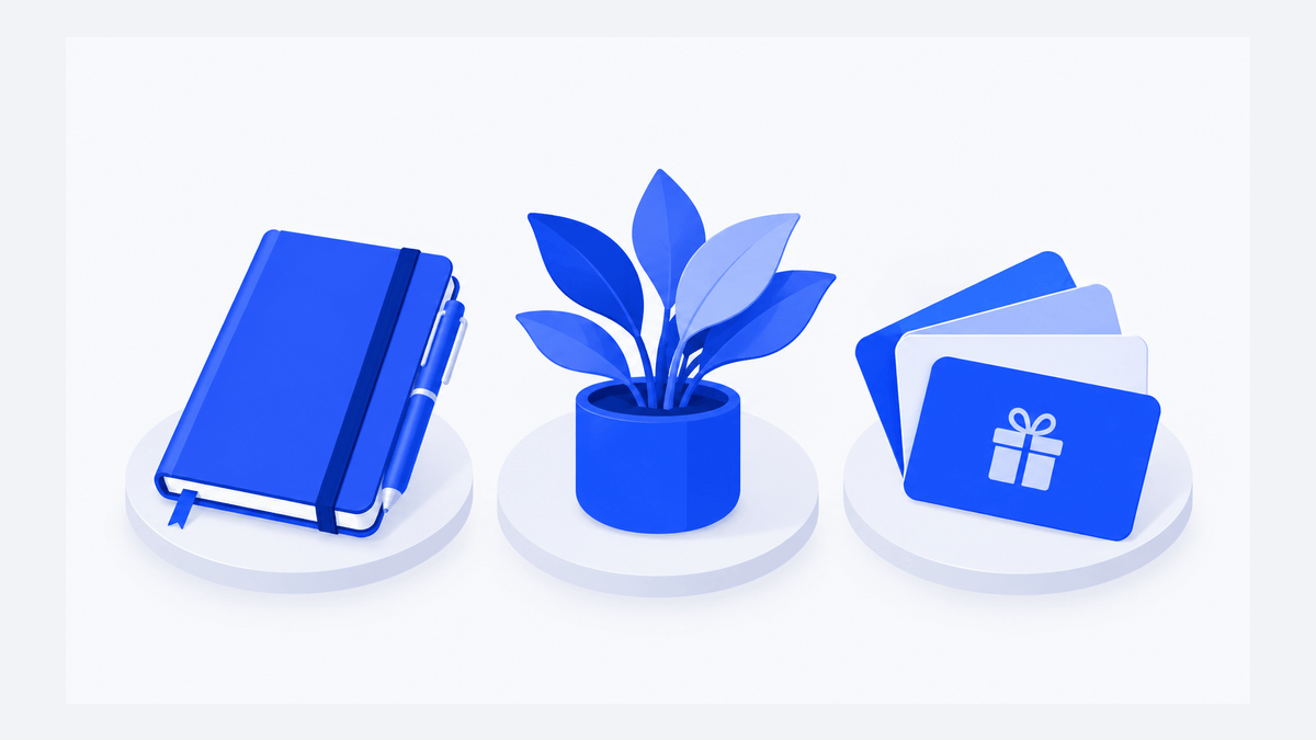 A notebook, a small plant, and a choice card arranged as different gift options