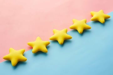 five stars on a pink and light blue background