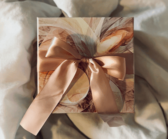 luxury gift box with pink ribbon