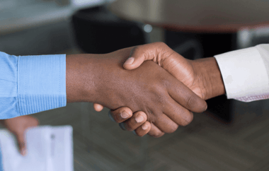 two employees handshake